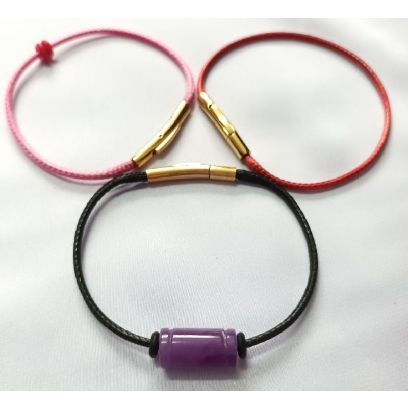 Vòng tay lu thống đầu xuôi đuôi lọt đá T.A tím khóa bấm cao cấp