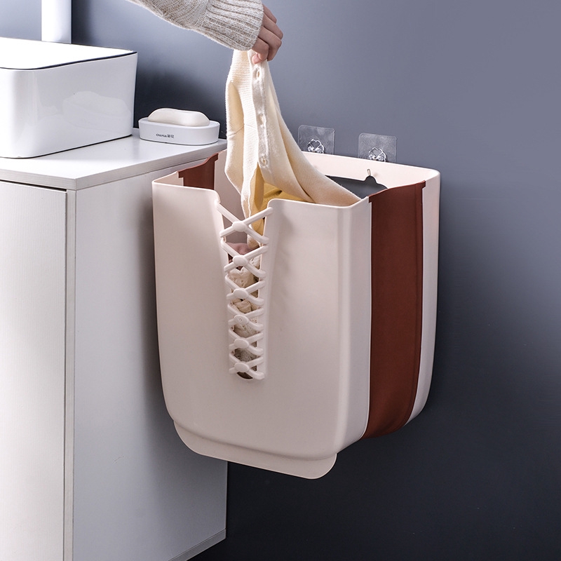 Collapsible wall mounted laundry basket