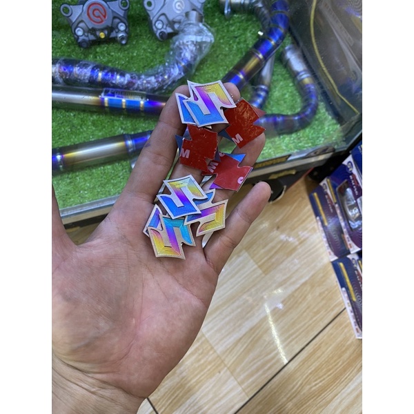 Chữ S dán đầu đèn satria raider fi titan