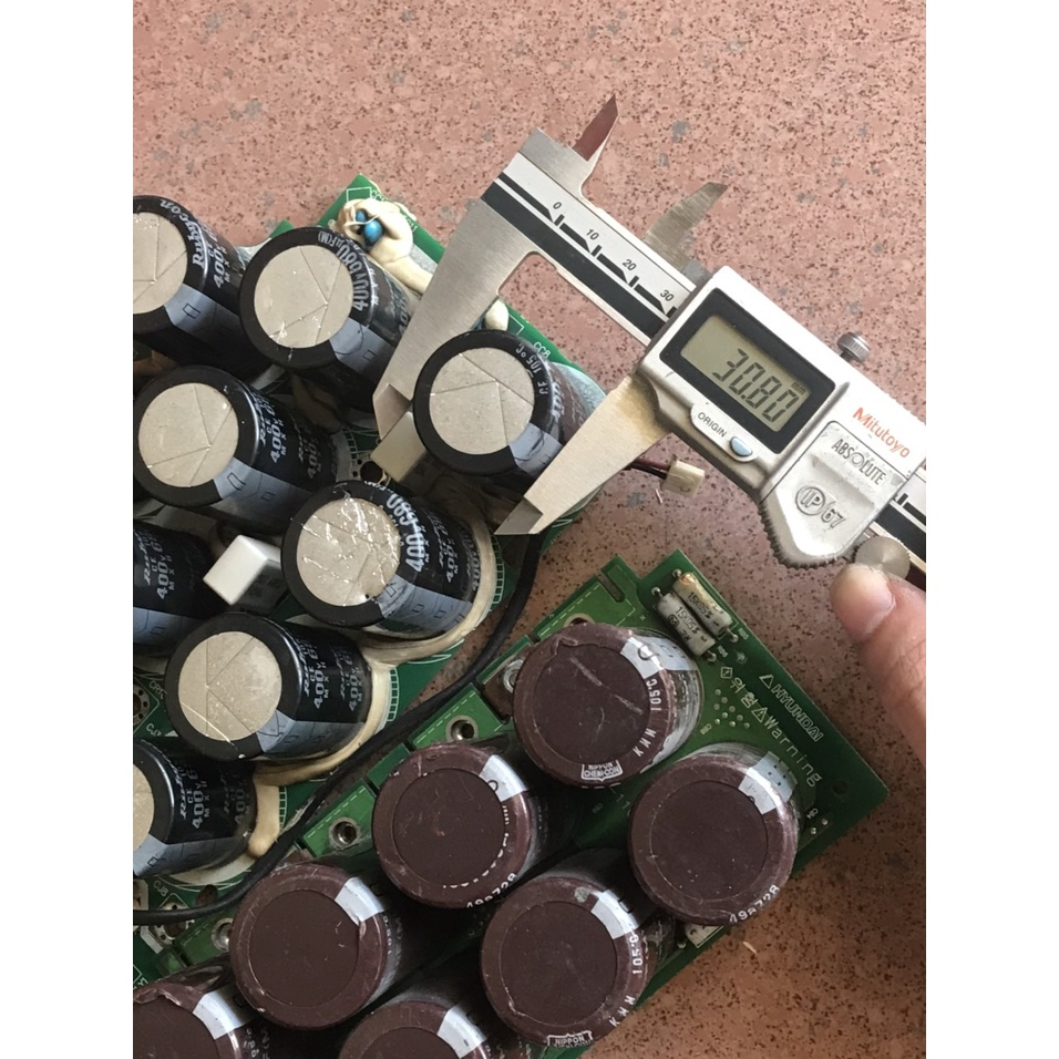 TỤ LỌC NGUỒN TỤ HOÁ MÁY HÀN 680uF 400V THÁO MÁY CHÍNH HÃNG