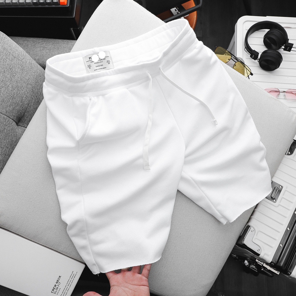 - Quần short nam cắt gấu dài ngang gối