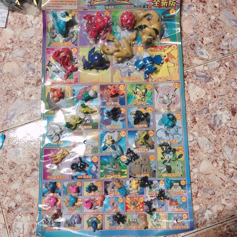 vỉ đồ chơi pokemon bốc thăm trúng thương vỉ 50 con thú.150phiếu