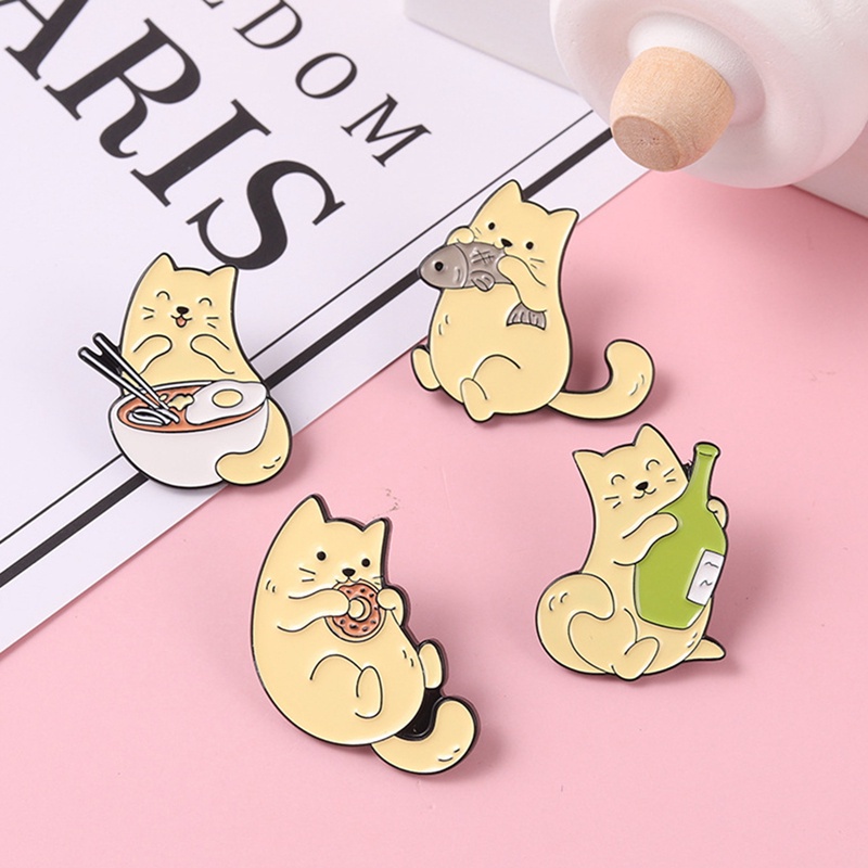 Huy hiệu cài áo hình chú mèo ăn bánh donut dễ thương