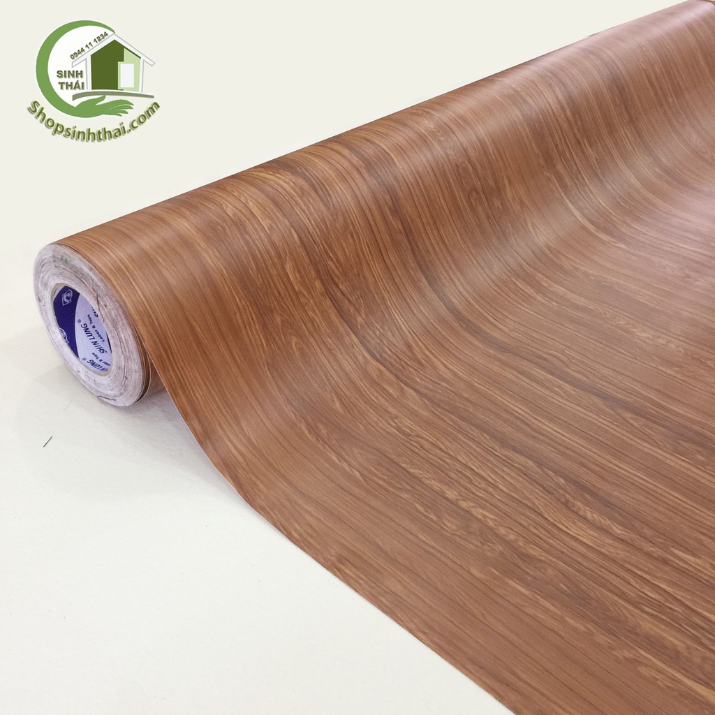 Giấy dán tường giả gỗ màu nâu nhạt,  có sẵn keo