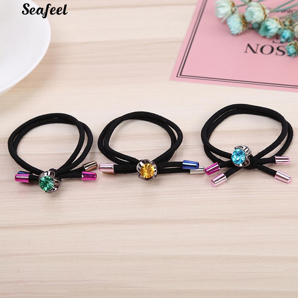 Thun cột tóc đính đá.