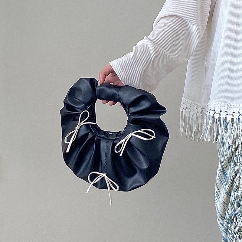 Túi xách tròn nhỏ đính nơ thời trang cho nữ