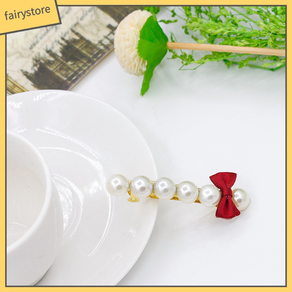 Kẹp tóc hình nơ đính ngọc trai thời trang