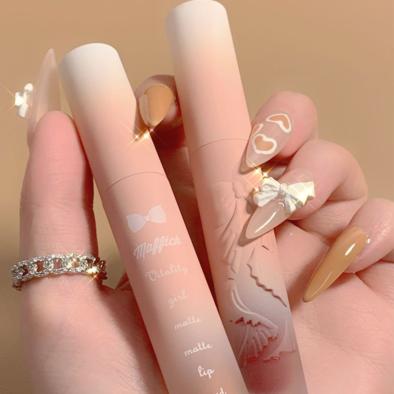 Son môi chống dính cốc thiết kế vỏ họa tiết nơ nổi dễ thương
