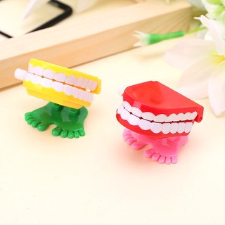 Đồ Chơi Răng Nhảy Lên Dây Cót