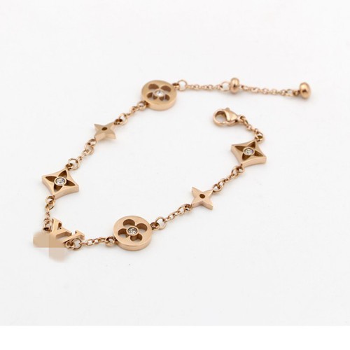 Lắc Tay Hoa Văn Titan Ko Đen TT 3234