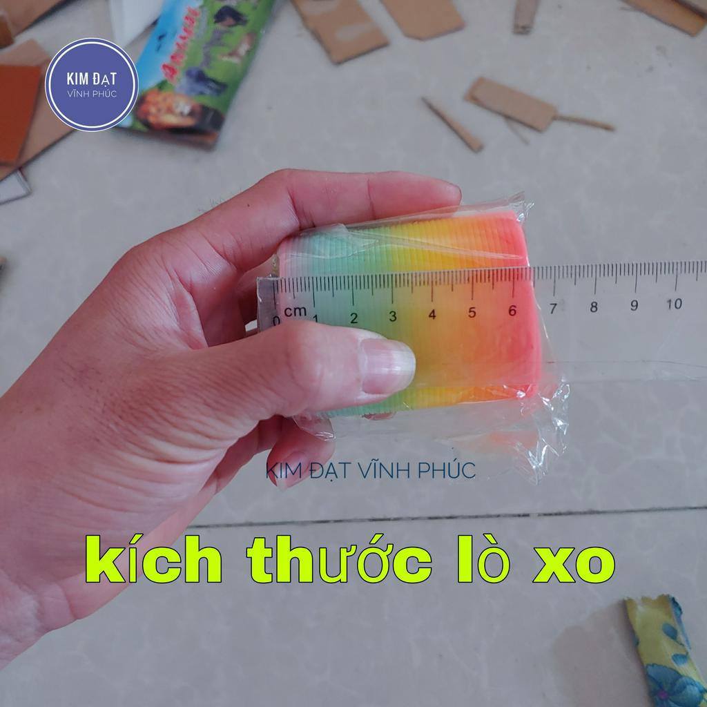 Đồ chơi lò xo . Lò xo cầu vồng kéo dãn cho bé