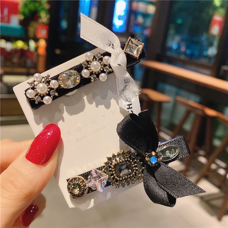 Kẹp tóc mái Hàn Quốc nơ đen đính đá nhiều kiểu dáng cực sang chảnh TB520