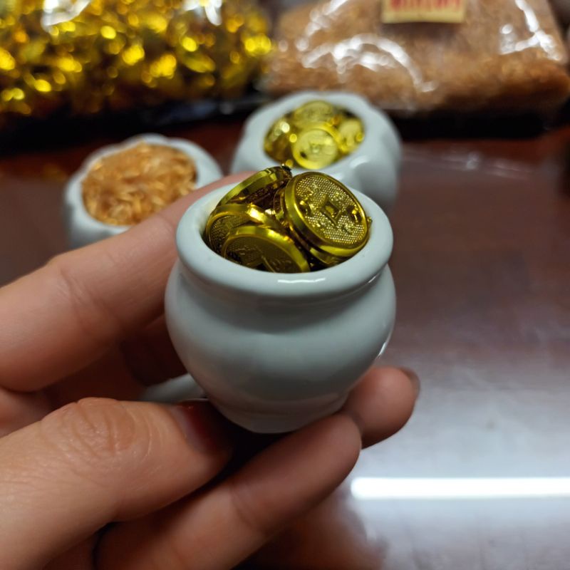 Hủ xu vàng, hủ đồng xu thần tài kích hoạt tài lộc may mắn