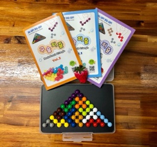 Câu đố viên bi Puzzlia - Bộ tam giác