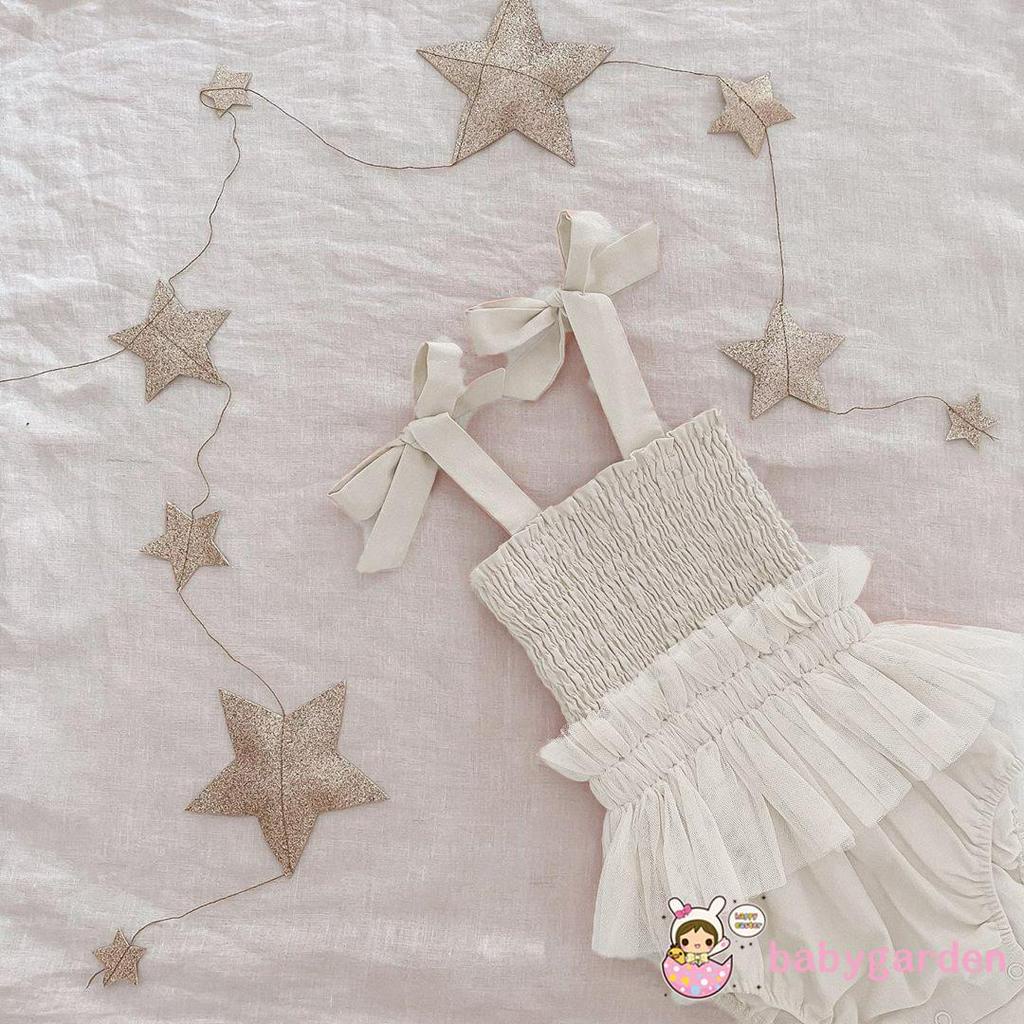 Áo liền quần đính nơ hợp thời trang cho bé gái