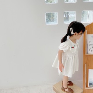 Váy thô trắng cổ hàn thêu hoa
