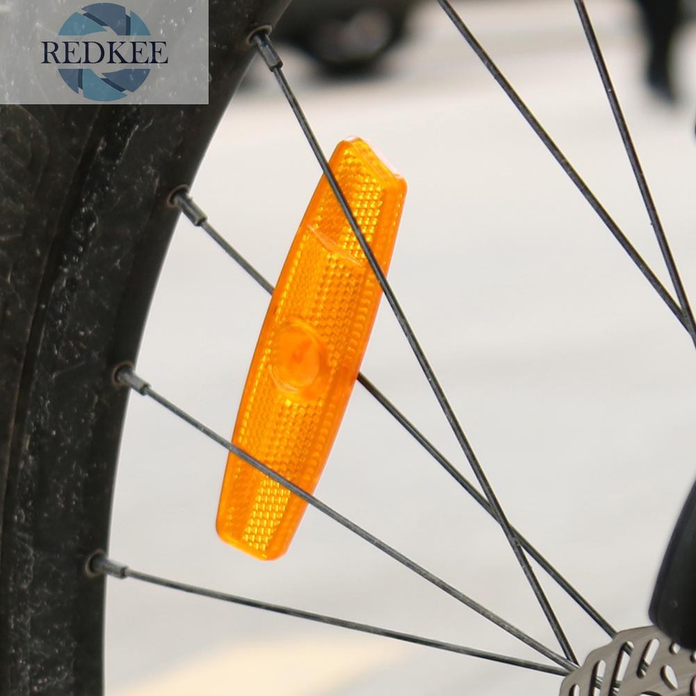 Bộ 4 Miếng Phản Quang Gắn Nan Hoa Xe Đạp Hình Dạng Con Cá Để Cảnh Báo An Toàn