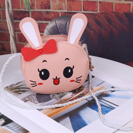 Túi đeo chéo mèo nơ va thỏ ăn cà rốt xinh xắn cho bé gái nhỏ diện đầm