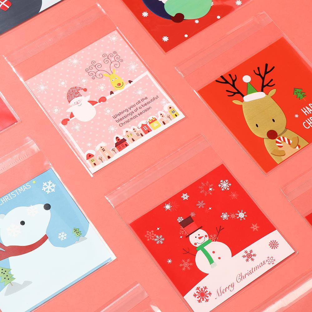 Set 100 Túi Đựng Bánh Kẹo Tự Dính Họa Tiết Người Tuyết Dễ Thương Cho Bé