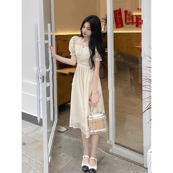 ĐẦM KEM MIDI CHÉO DÂY CỔ TAY BO