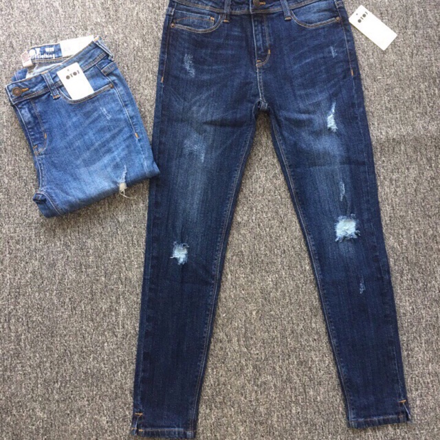 jeans skinny rách xẻ lai