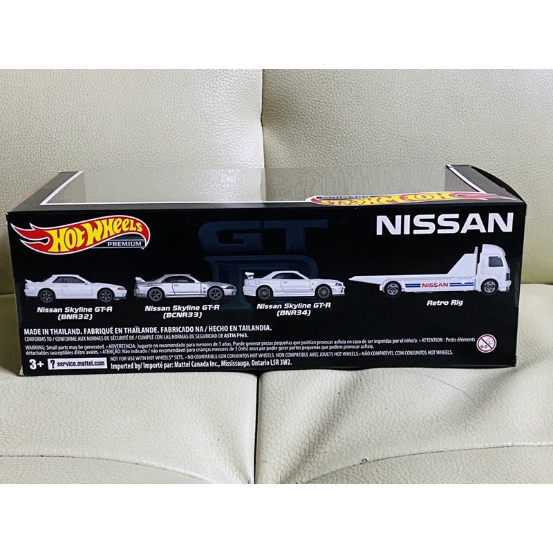 set Xe Mô Hình Hot Wheels Premium Team Tránport Nissan Walmart Exclusive