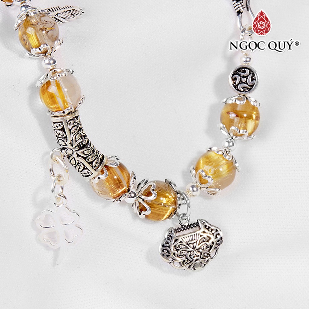 Vòng tay TA tóc vàng charm bông tuyết hạt 8mm - Ngọc Quý