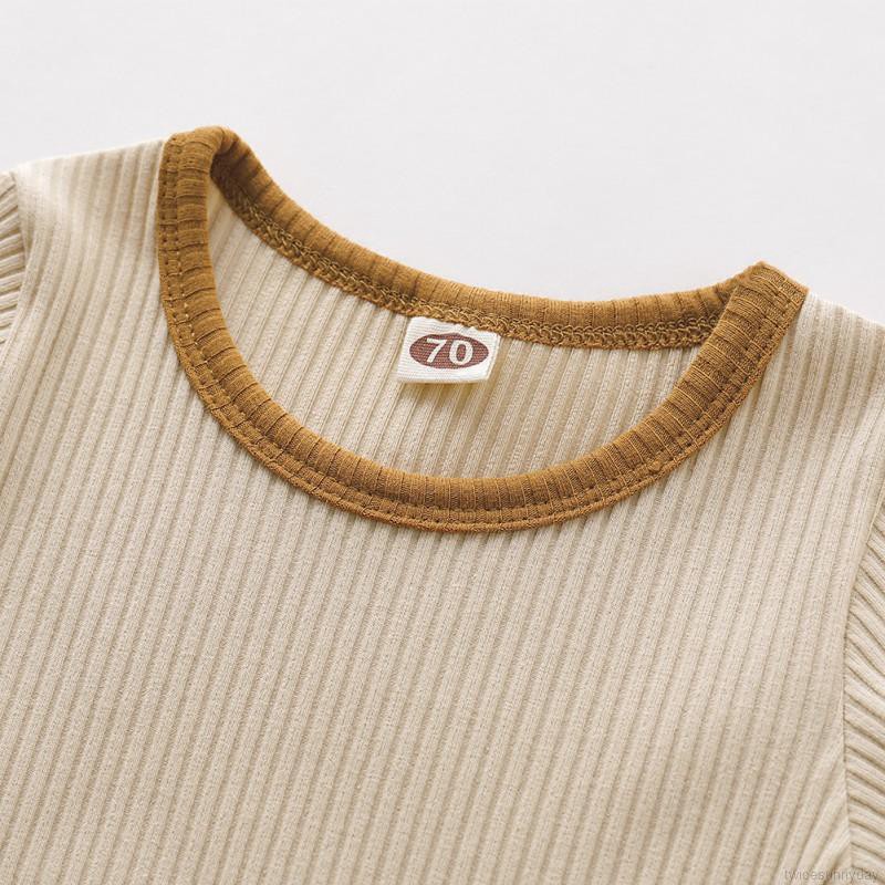 Bộ áo liền quần màu trơn cho bé