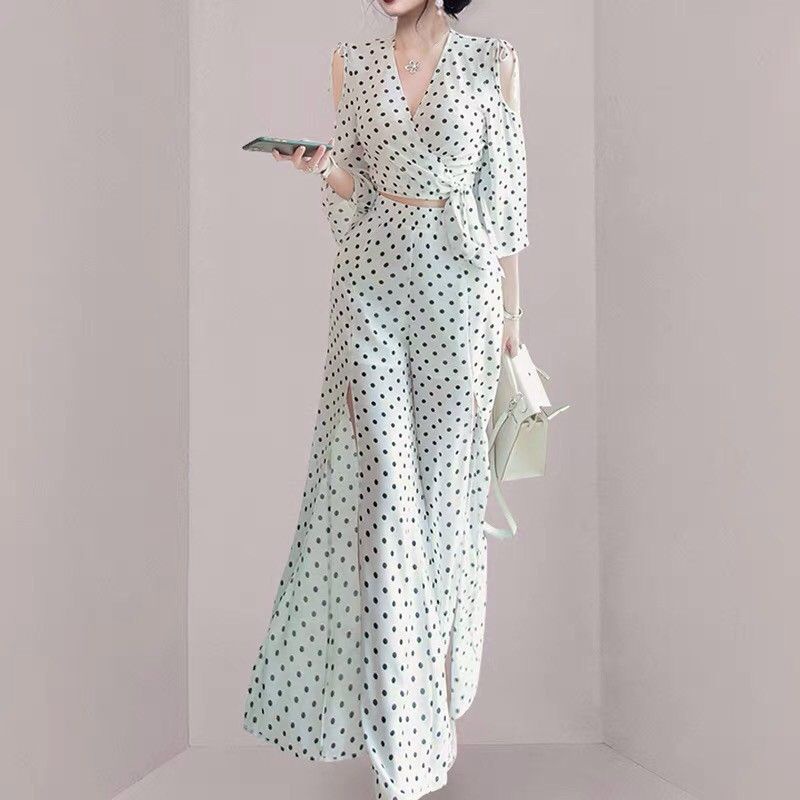 Set Bộ quần áo croptop hở vai đính nơ, tay lở, cổ v đắp chéo, quần suông xẻ tà trước, dây kéo sau lưng Lh0917399527