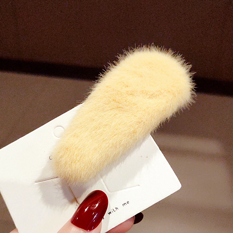 Kẹp tóc mái phối lông dễ thương hình elip