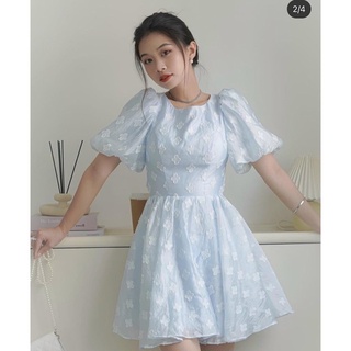 Đầm xanh hoa nổi hở lưng đan dây chéo