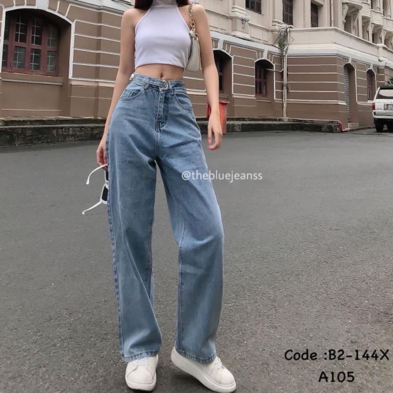 Quần jean ống rộng khuyên tròn dây khuy