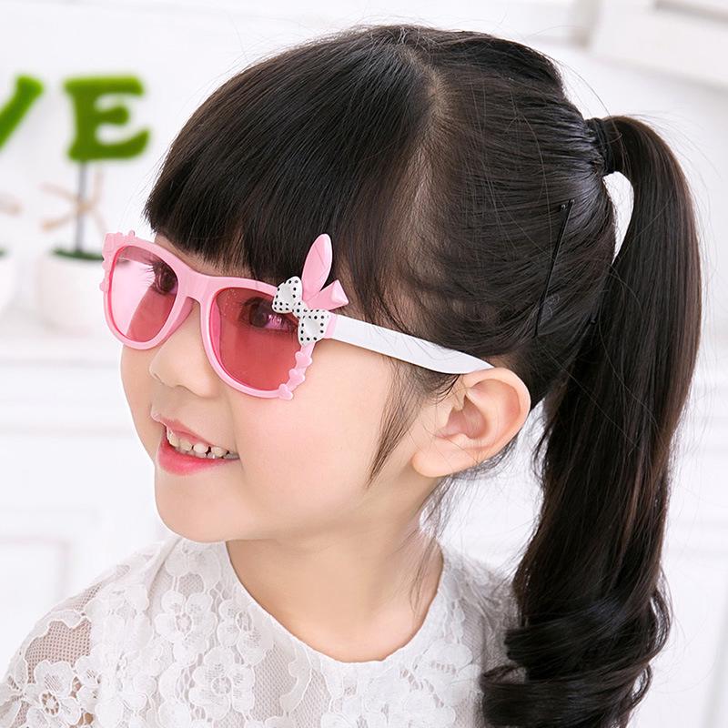 Kính râm gắn hình tai thỏ và nơ xinh xắn dành cho trẻ em