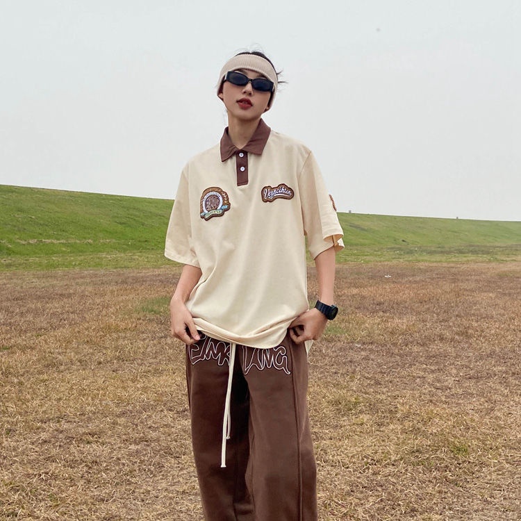 Áo polo Ngắn Tay Dáng Rộng Cổ Đứng Thêu Họa Tiết Đơn Giản Theo Phong Cách Retro Dành Cho Nữ