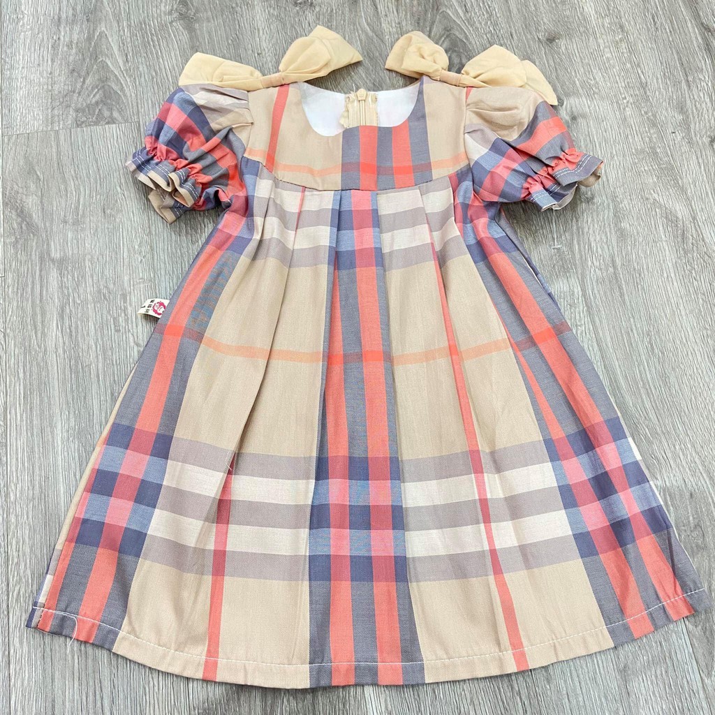 Váy bbr cho bé gái đính nơ vai