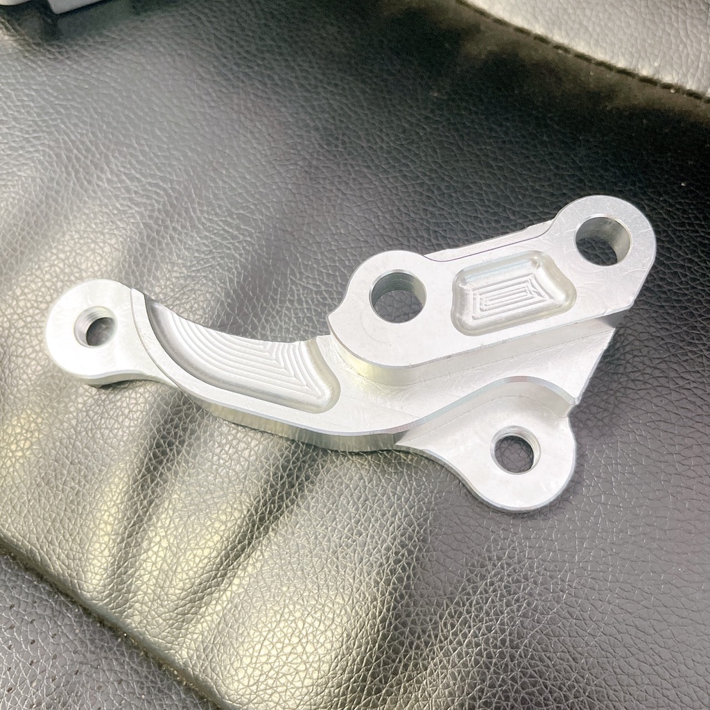 Pát trước Sirius/Ex 2010 đĩa 260/267mm xài heo Adelin 4Pis. Pad heo dầu