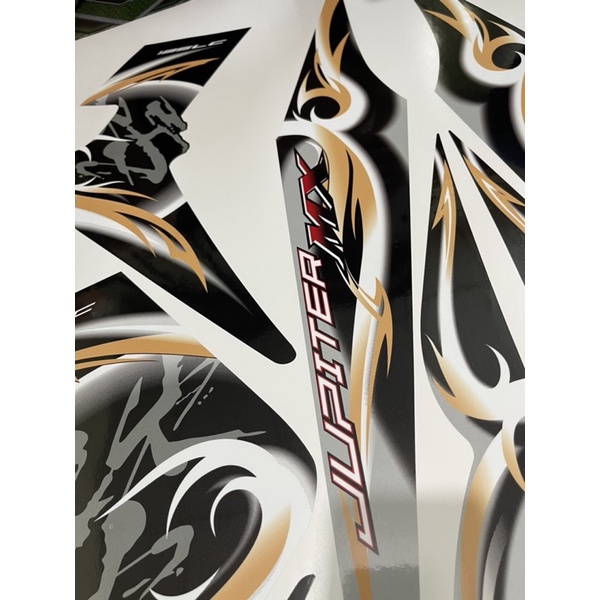 Tem Jupiter Mx vàng đồng dán Exciter 135 đen bạc