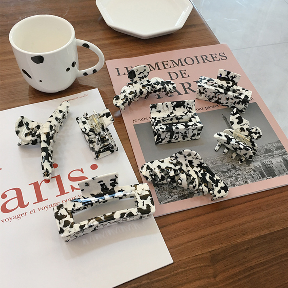 Kẹp tóc họa tiết bò sữa xinh xắn cho nữ