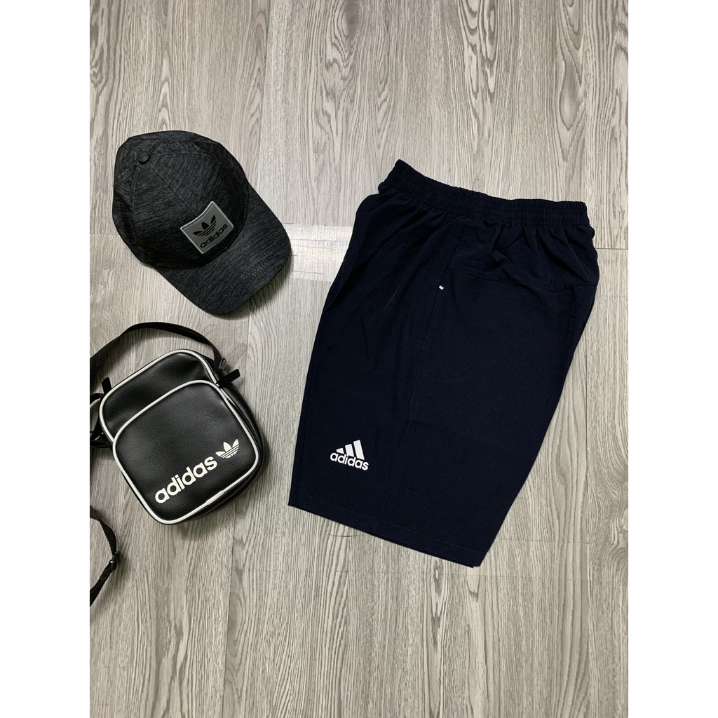 Quần đùi nam thể thao, quần short nam, chất gió co giãn ba túi khóa | BigBuy360 - bigbuy360.vn