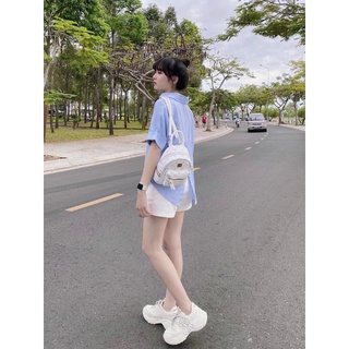 Set sơmi nút sau và short trắng