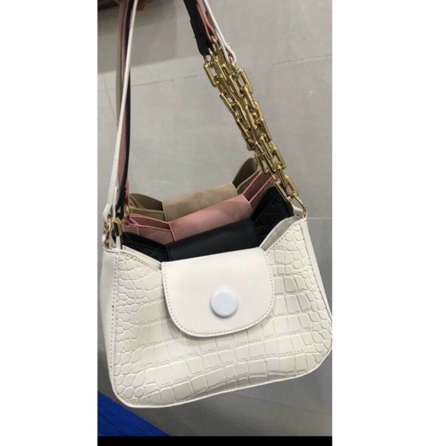 Túi kẹp nách da rắn phối nút thời trang