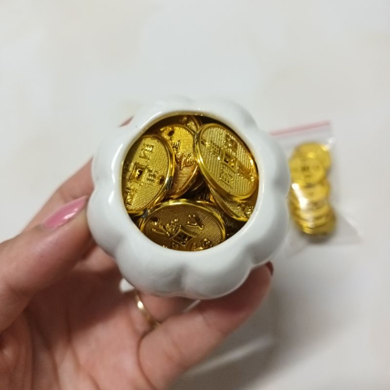 Hủ xu vàng, hủ đồng xu thần tài kích hoạt tài lộc may mắn