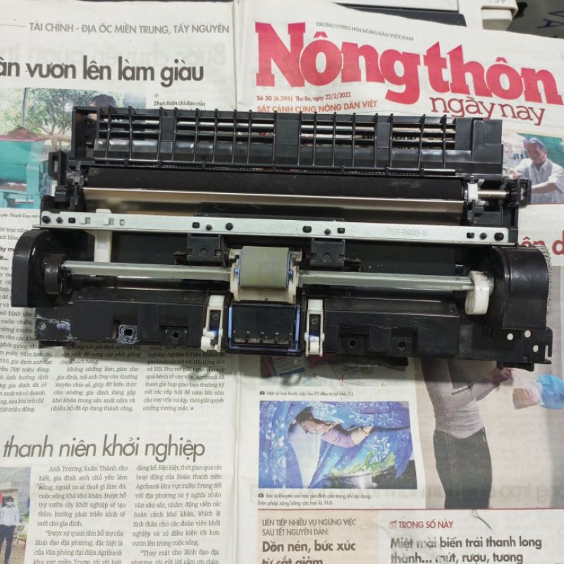 Bệ trục kéo giấy canon 2900/300 tháo máy