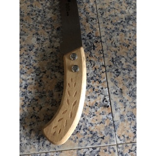 xứa cầm tai cán gỗ