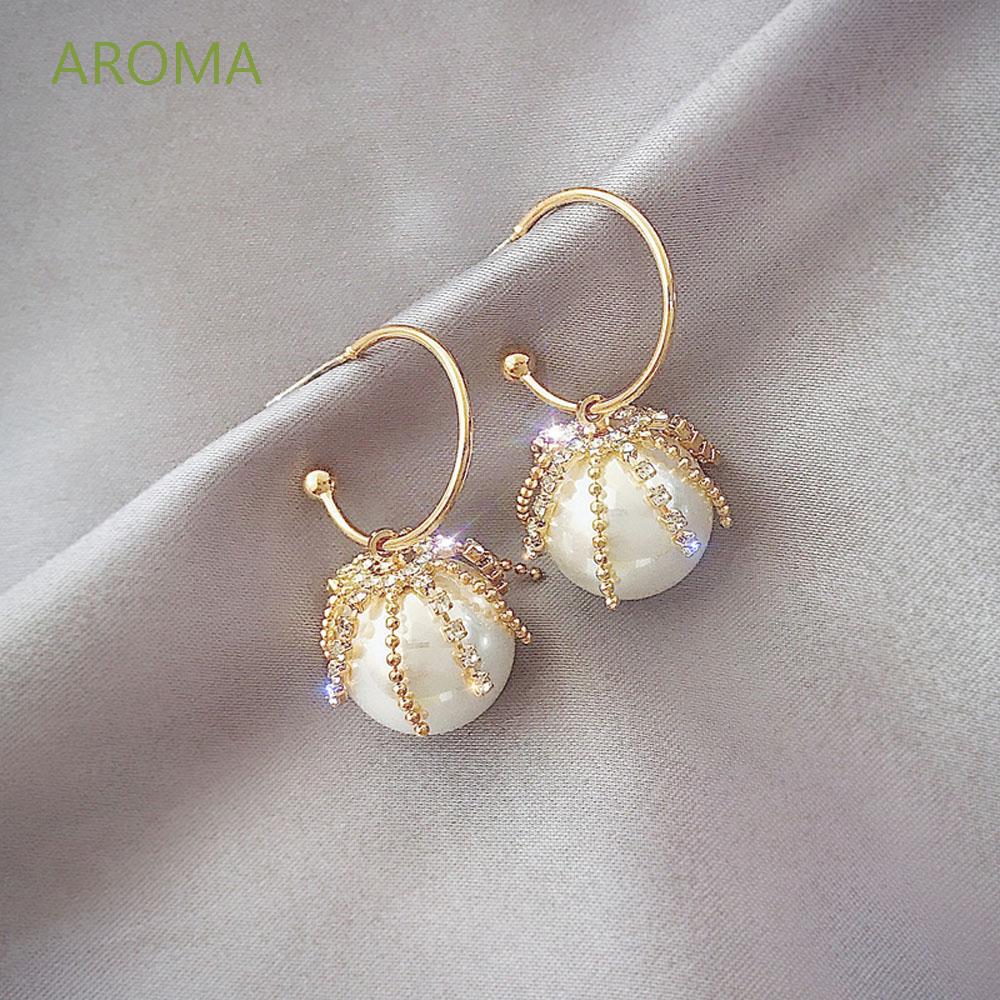 Khuyên tai nữ trang dáng tròn tạo hình độc đáo