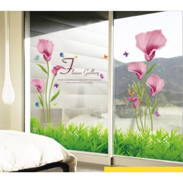 Decal hoa lay ơn chân tường cỏ xanh