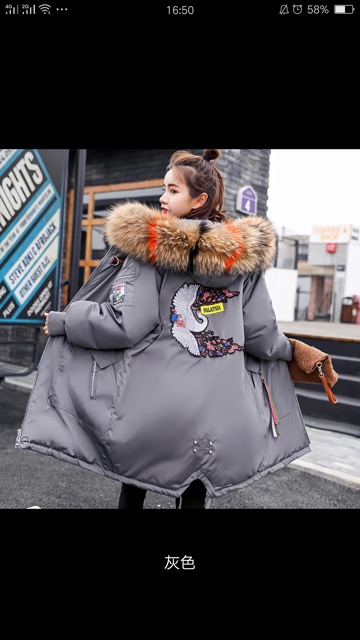 Áo phao nữ dáng dài thêu hình ở lưng hàng QCCC | BigBuy360 - bigbuy360.vn