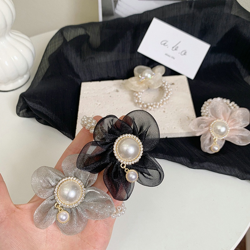 Dây Cột Tóc Co Giãn Đính Hoa Hướng Dương Và Ngọc Trai Xinh Xắn