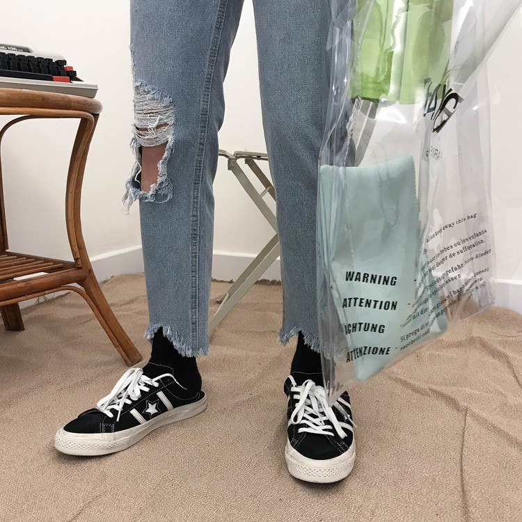 Quần Baggy Jean rách gối - Gấu lệch tua rua