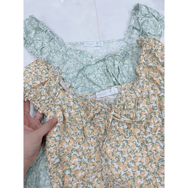 Đầm hoa nhí tay nhún xuất dư xịn